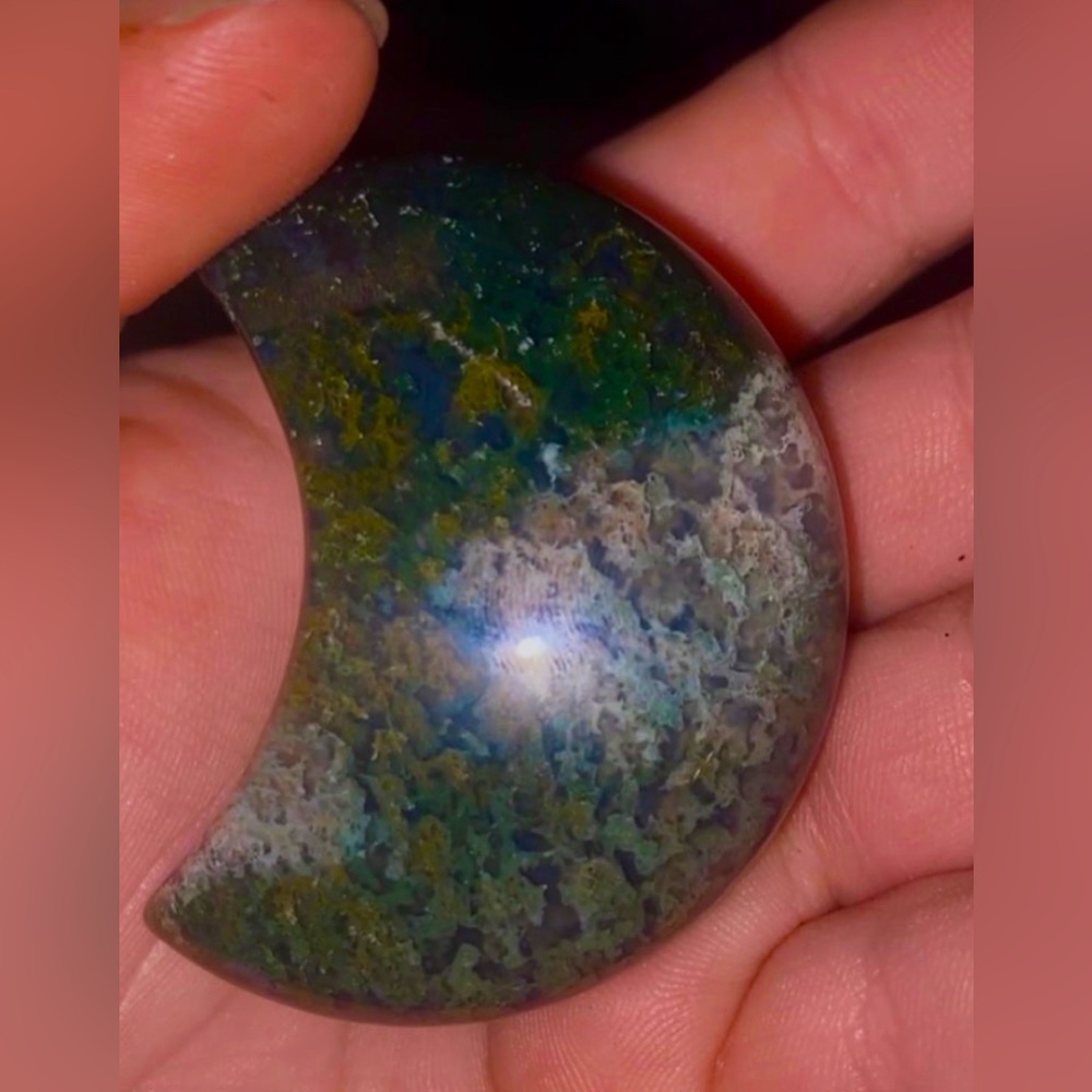 Stunning moss agate moon carving